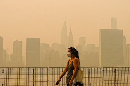 Smoke from massive wildfires in Canada engulfed the New York City skyline, reducing visibility and casting an orange haze over city on July 16, 2026.