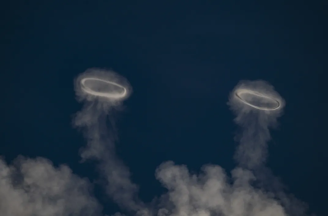Two rings of condensed water vapor in the sky