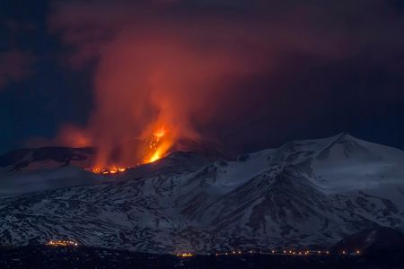 Mt. Etna spews lava during the early hours of Thursday, March 16, 2017