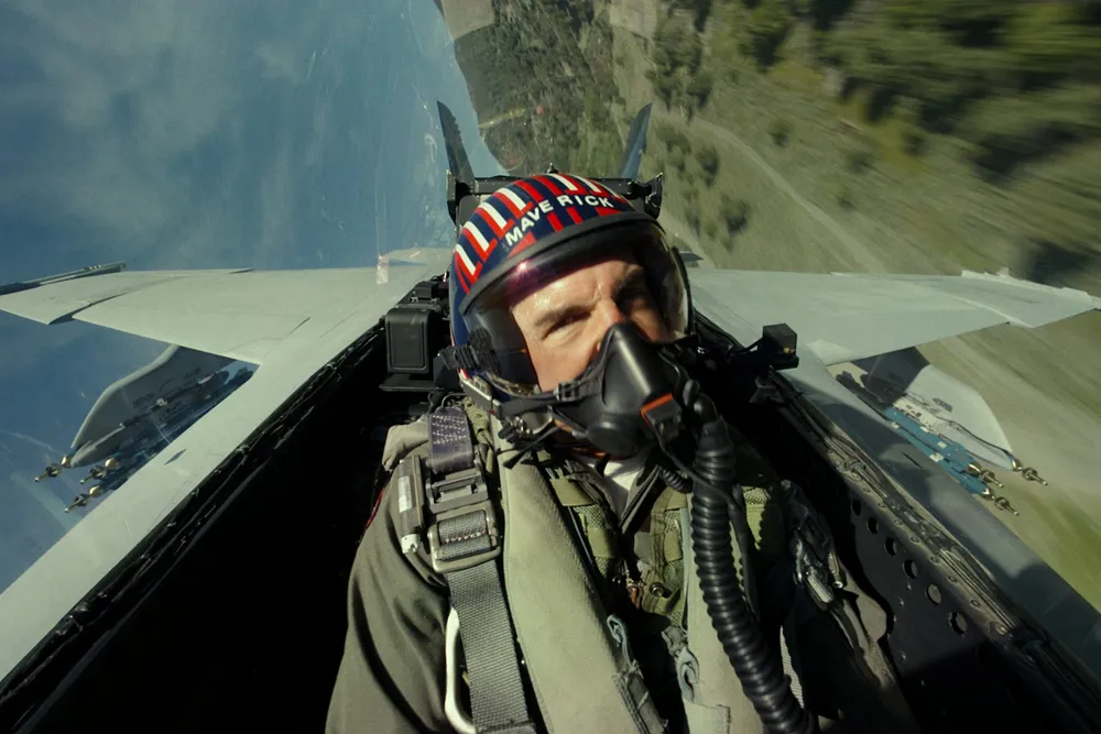 Tom Cruise as Pete "Maverick" Mitchell in