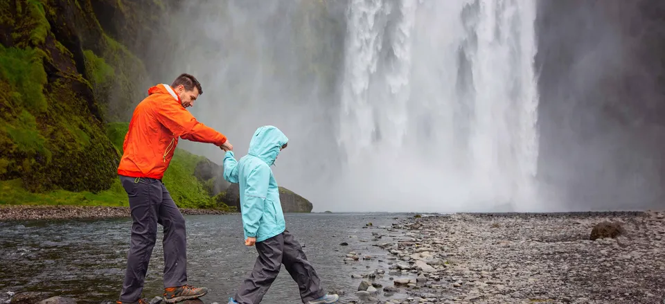  Father and son exploring a waterfall 