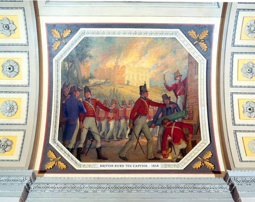 A mural of British troops, distinguished by their red coats, burning the Capitol building; it stands behind the officers and lights up the night sky