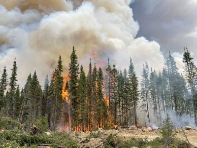 A wildfire burns in Quebec, Canada, in June of last year. Smoke from the fires drifted south to the United States.