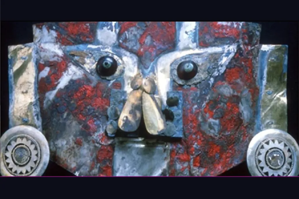 Gold mask with paint