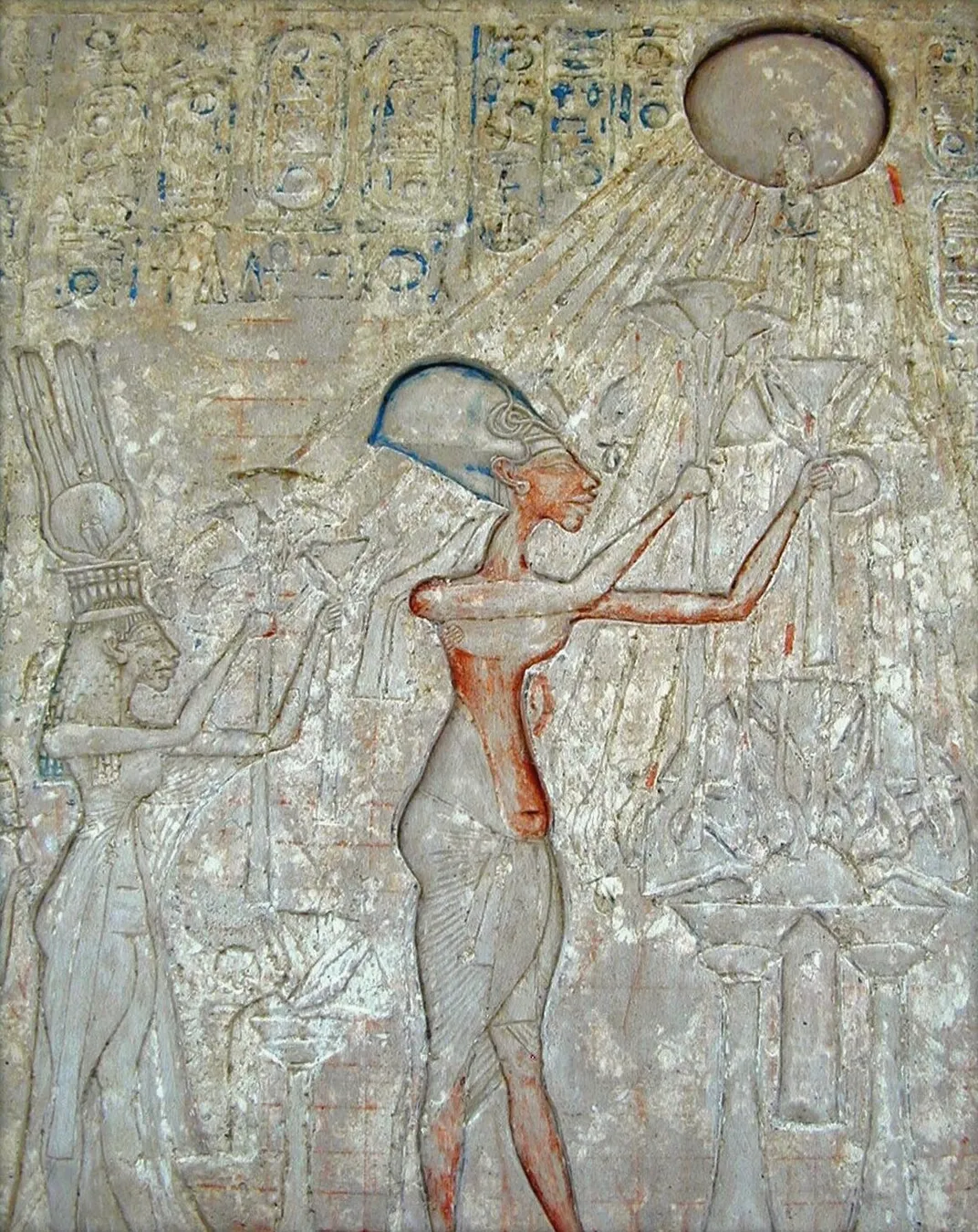Limestone relief of Nefertiti, Akhenaten and their children adoring Aten