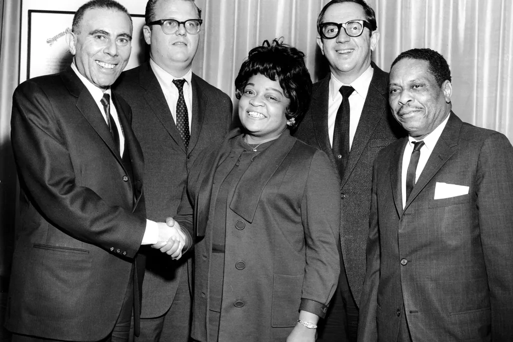 Vivian Carter (center) and her husband, Jimmy Bracken (far right)