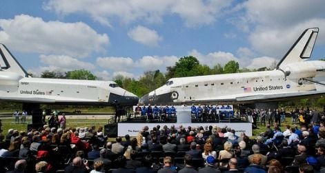 Discovery, right, greets the departing Enterprise, left, at the Welcome Discovery ceremony.