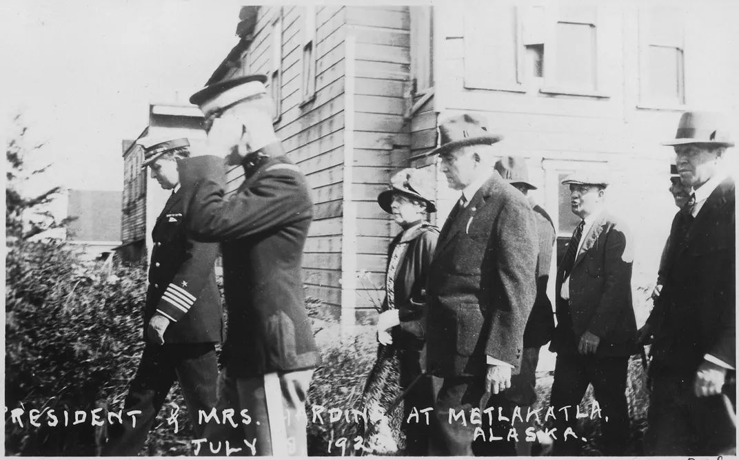 Warren G. Harding (middle row, with hat) and his wife, Florence Harding, in Metlakatla, Alaska, in July 1923