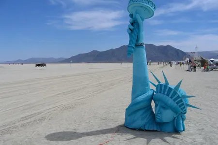 A Burning Man tribute to the last remnants of humanity, a buried Statue of Liberty, depicted in the 1967 science fiction film, Planet of the Apes. 