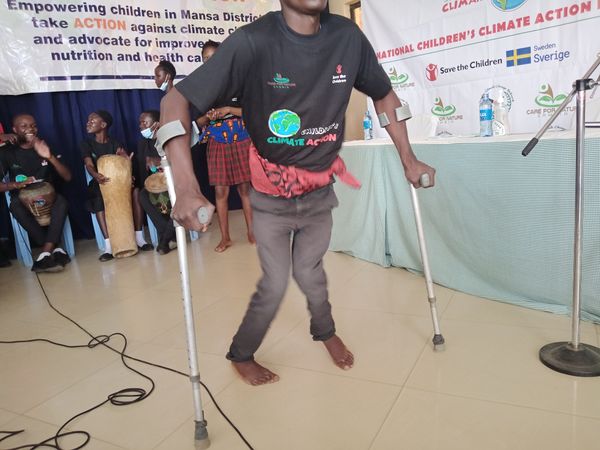 A differently-abled pupil entertains guests during a climate event. thumbnail