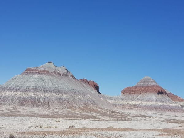 Multi colored hills at Petrified Forest National Park thumbnail