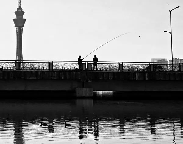 Fishing by the bridge thumbnail