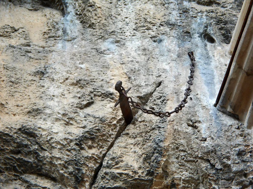 Sword in wall close-up