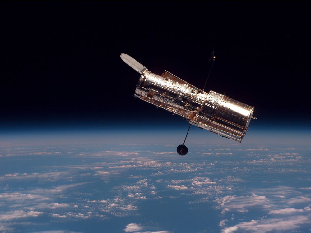 Hubble telescope orbiting Earth