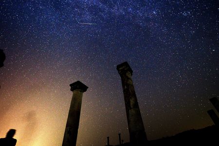 A Perseid streaks across the sky over the archaeological site Stobi in modern-day Macedonia