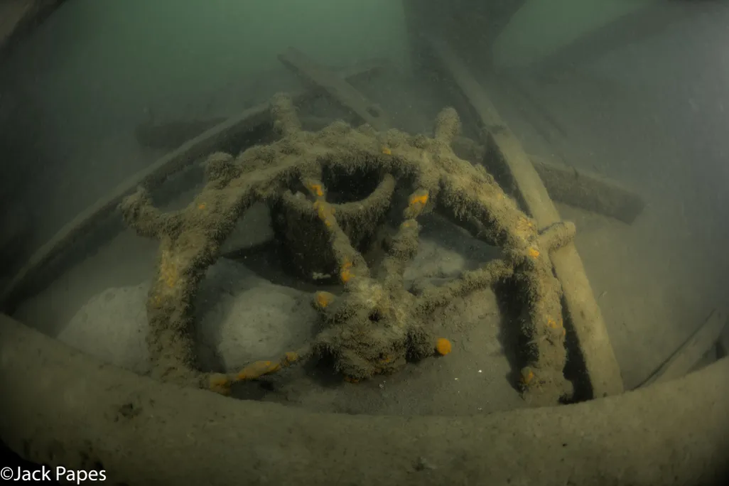 Underwater view of the steering wheel of a ship