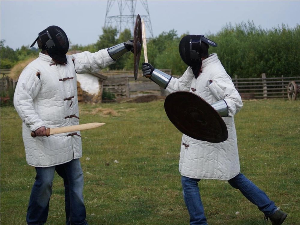 Scientists stage a sword fight