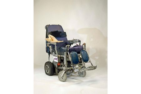 Roberts' wheelchair sports a reclining seat, a headlight for nighttime driving and a space in the back for a respirator and a small portable ramp.
