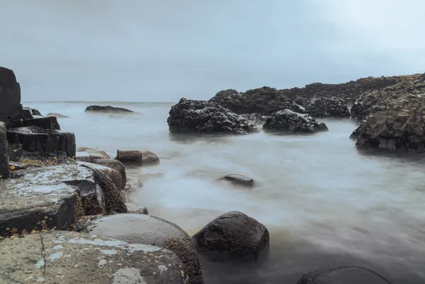 Misty Tides on Jagged Rocks thumbnail