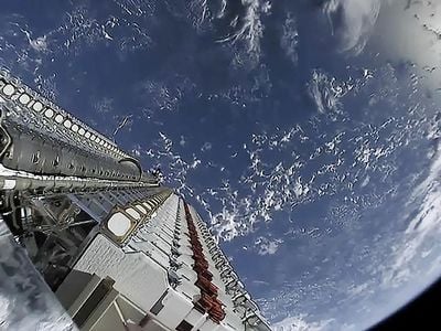 Just before deployment on May 24, 2019, the first 60 Starlink test satellites rest in a stack before separation from the Falcon 9 second stage. There is no dispenser mechanism; as one SpaceX controller put it, “they slowly fan out like a deck of cards into space.”