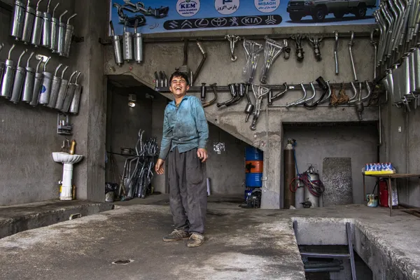 Laughing child laborer thumbnail