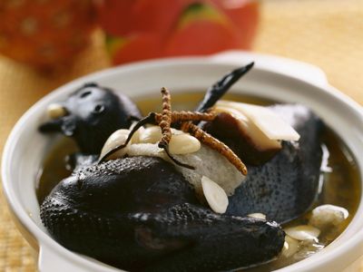 Black chicken served with bamboo shoots and caterpillar fungus
