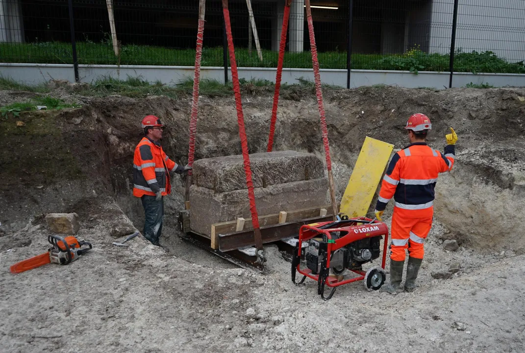 sarcophagus being lifted