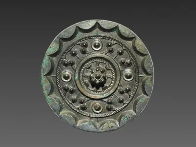 Bronze mirrors like the one pictured here were luxury items in Han dynasty China. Researchers recently discovered a trove of 80 ancient mirrors at a cemetery in Shaanxi Province.