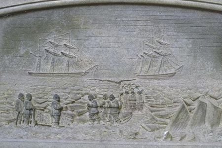 A stone etching on the grave of crewmember Lt. John Irving depicts the dire conditions that the Franklin expedition faced when they reached the Canadian Arctic. 