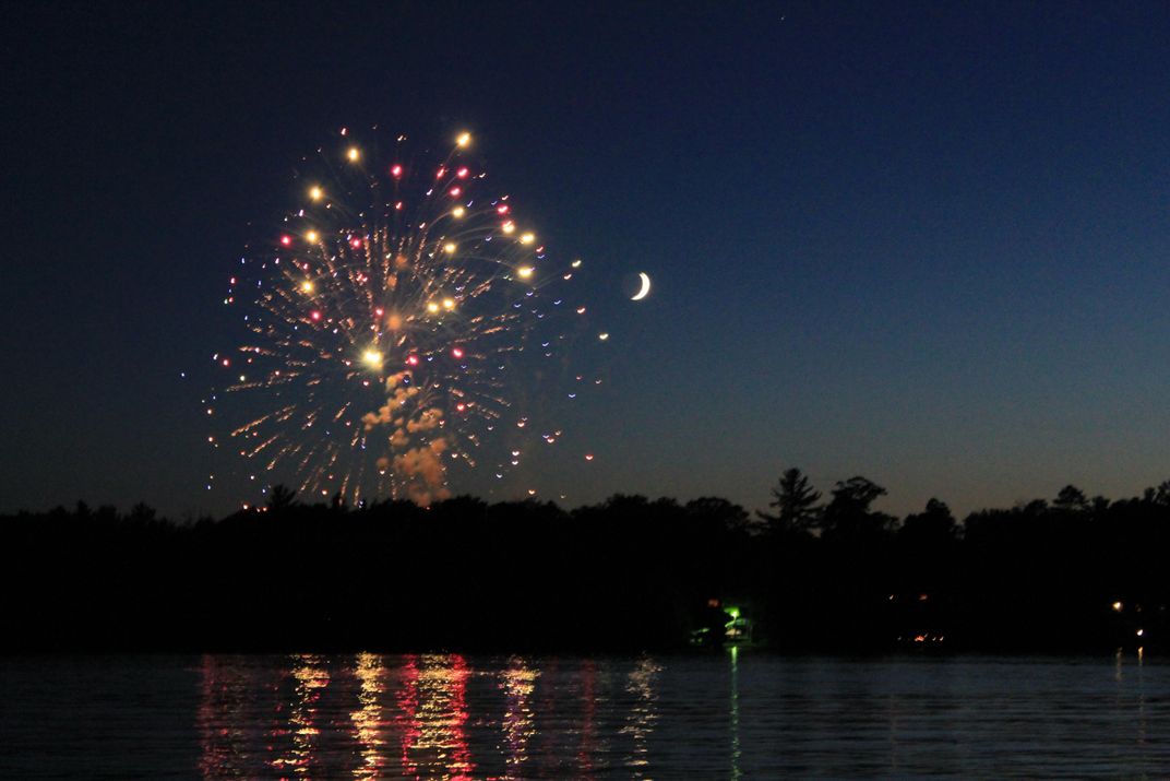 Watching the fireworks on the lake in the midwest is the best way to