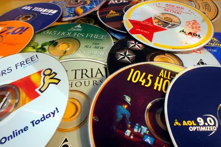 A collection of CDs advertising AOL&#39;s dial-up internet services