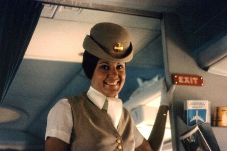 Sorry about the delay, folks. A Pan Am flight attendant circa 1970.