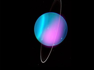 The pink splotch on the planet shows the X-rays detected in 2002 imposed on a photo of Uranus taken in 2004 at the same orientation.

