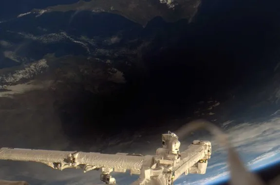 The Moon’s shadow during a solar eclipse, as seen from the International Space Station.