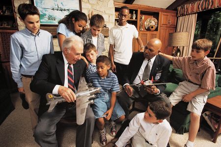 After they reunited, John Leahr (above, right) enlisted Herb Heilbrun in his ongoing campaign to make sure everyone, from schoolkids to the elderly, hears the story of the Tuskegee Airmen.