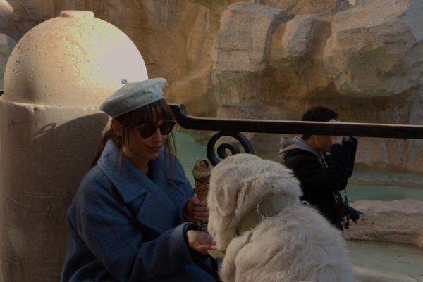 Woman in a fedora hat and her golden retriever thumbnail