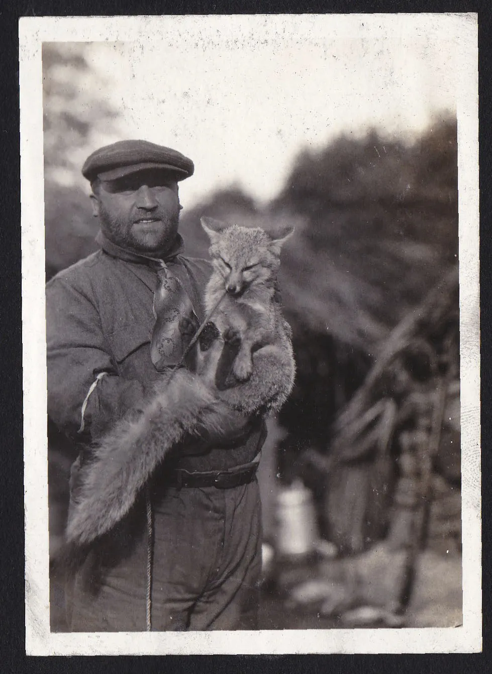Sam Ravel holding a fox