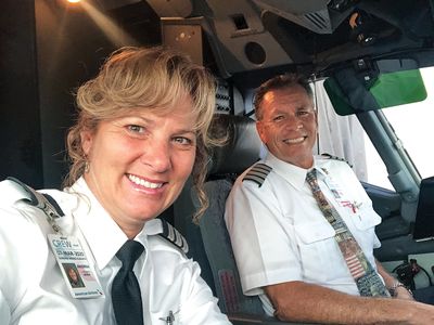 Andrea and Kevin Eldridge report for another day at the office, an American Airlines Boeing 737. They have also shared the cockpit of a Luscombe 8 and a B-25.