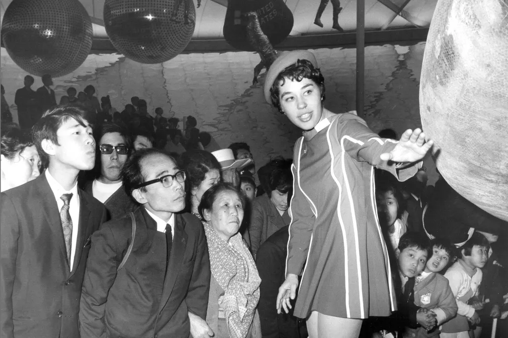 Beverly Gray at a 1970 expo in Japan explaining a spacecraft