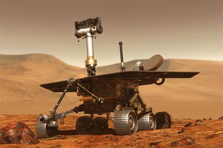 Since early 2004, the Mars rovers have gathered images of rocks and terrain where water, the presumed prerequisite of life, once flowed (an artist's rendition).