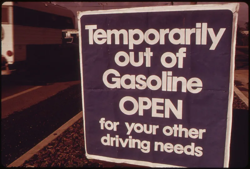Sign reading "Temporarily out of gasoline. Open for your other driving needs"