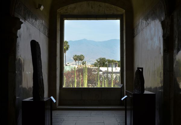 Mountains past cathredral window in Oaxaca thumbnail