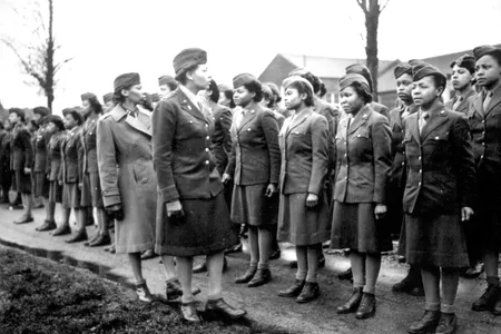 The 6888th Central Postal Directory Battalion stands at attention during an inspection in England in 1945.