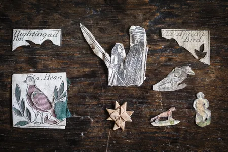 Preteen and teenage schoolgirls made these tiny paper cuttings in the 17th century.