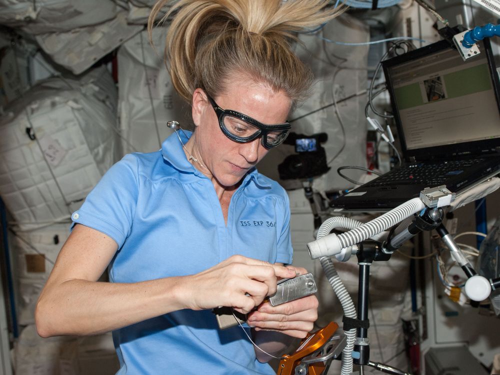 Karen Nyberg works aboard the International Space Station