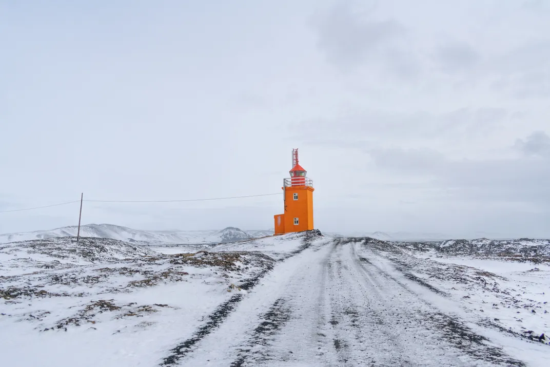 3 - Standing at nearly 38 feet, the Stafnes Lighthouse on the coast of the Reykjanes Peninsula in Iceland boasts a distinct orange hue and rectangular shape.