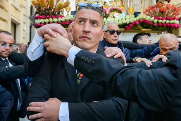 Carriers at "I Misteri" the 24hour Holy Week Procession in Trapani, Sicily thumbnail