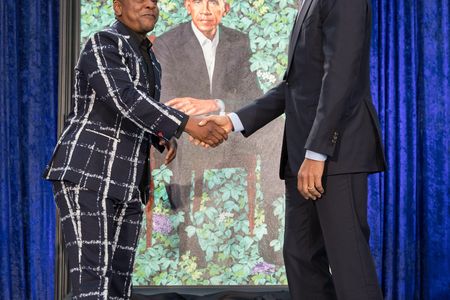 Both Kehinde Wiley and Obama said they were struck by parallels in their life stories. “Both of us had American mothers who raised us, with extraordinary love and support,” Obama said. 