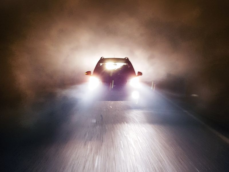 A Car on a foggy road Smithsonian Photo Contest Smithsonian Magazine
