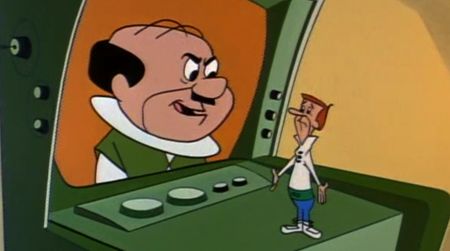 A miniaturized George Jetson talks to his boss Mr. Spacely on a videophone (1963)